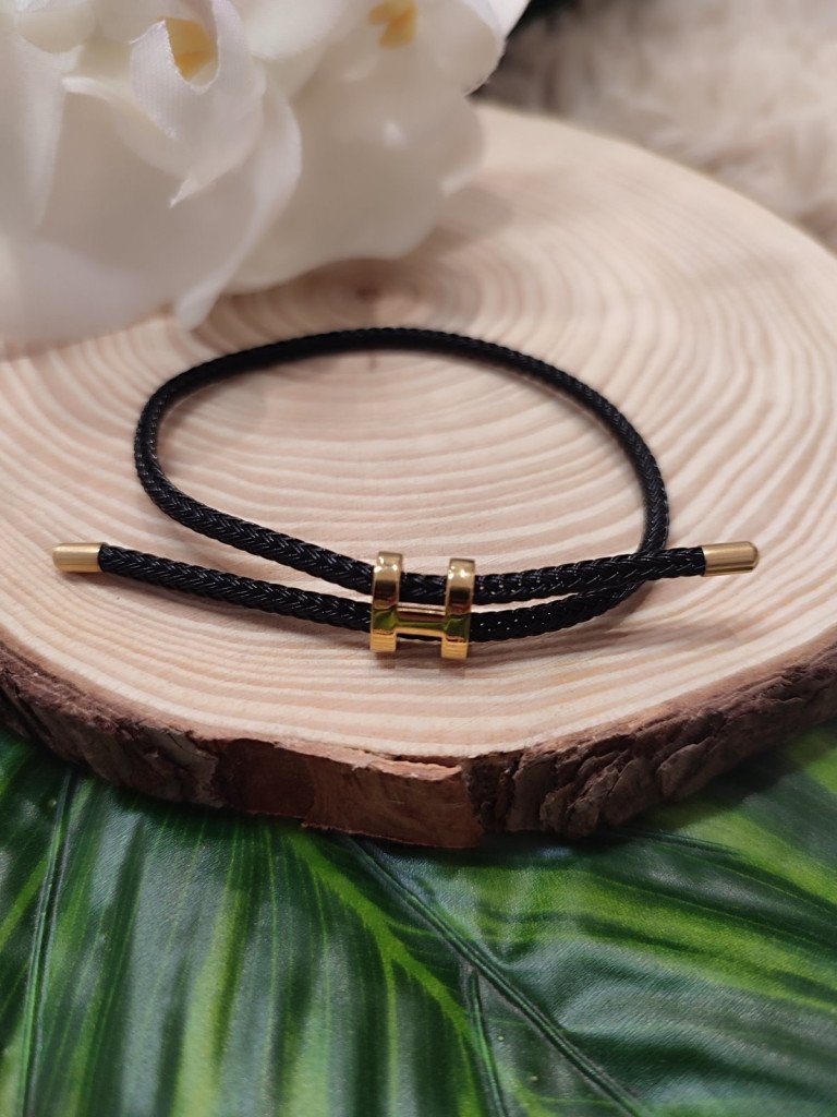 PULSERA H.